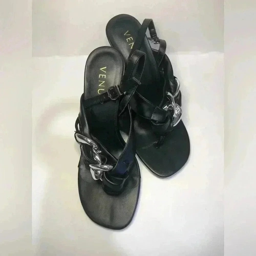 Black and silver heels size 7.5